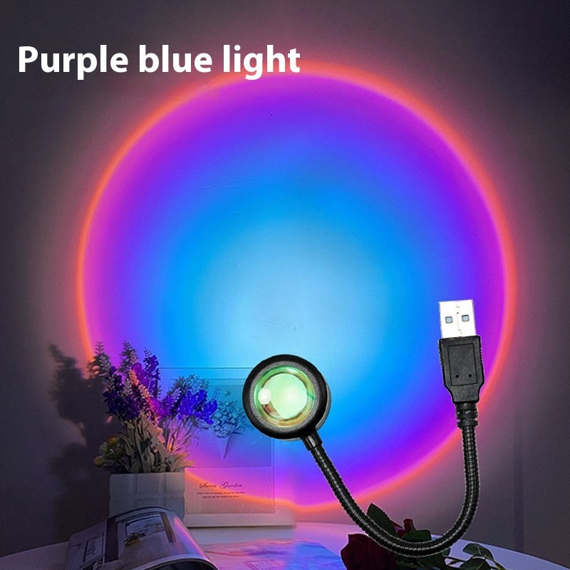 USB Sunset Projection Lamp showcasing purple blue light effect on wall with USB connection.